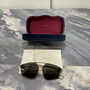 Gucci GG0437SA shiny gold and grey